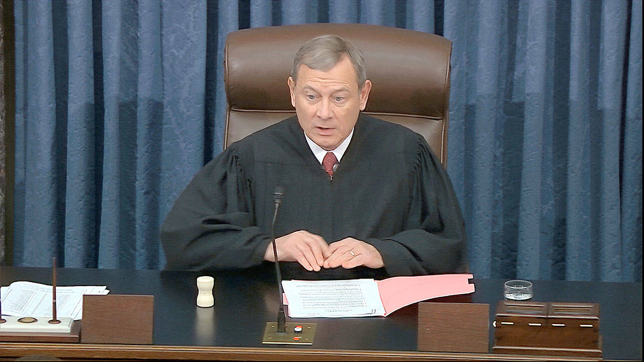 In this image from video, Chief Justice of the United States John Roberts speaks before the vote in the impeachment trial against President Donald Trump in the Senate at the U.S. Capitol in Washington on Wednesday, Feb. 5, 2020. (Senate Television via The Assciated Press)