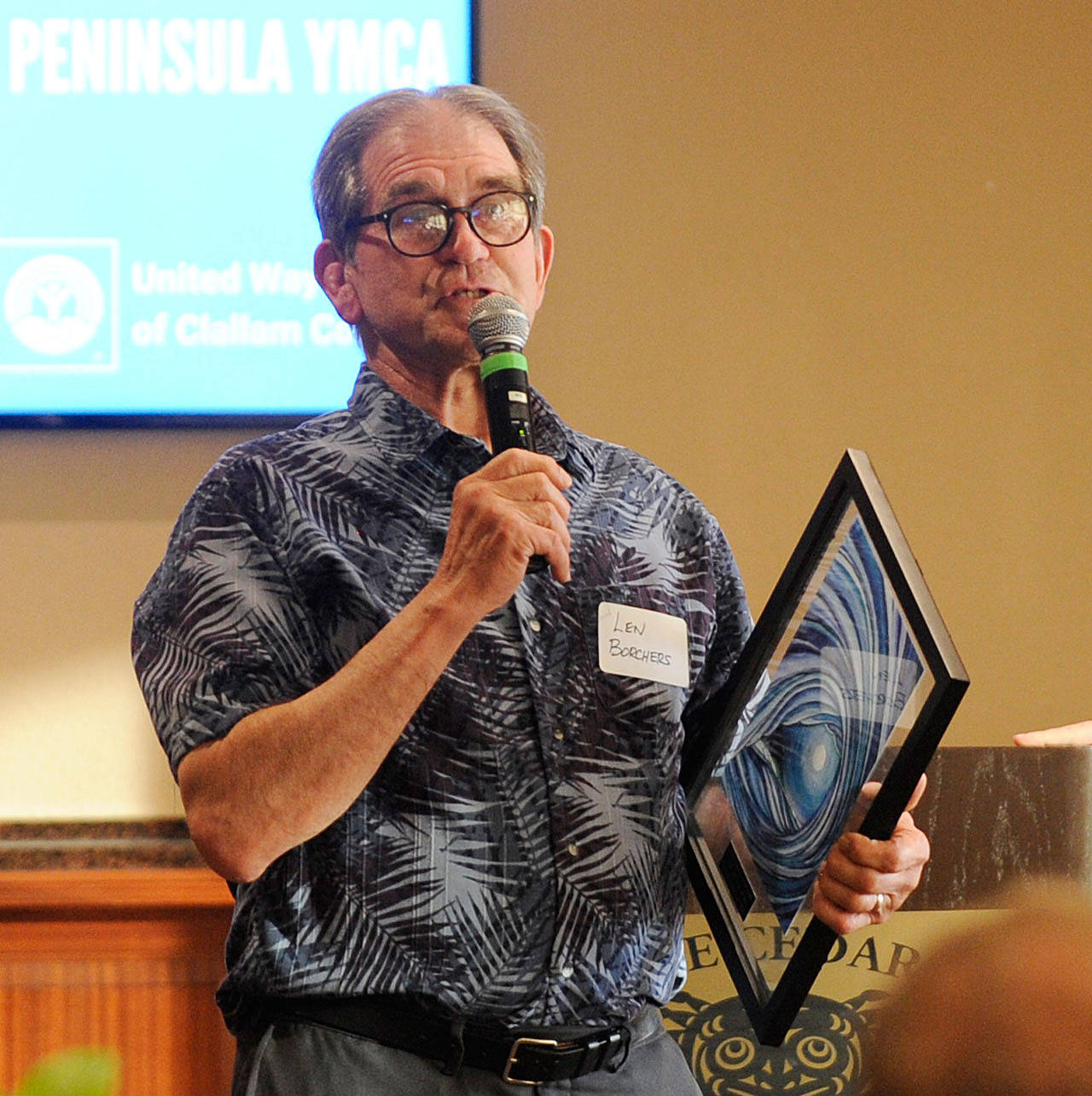 Len Borchers, chief executive officer of Olympic Peninsula YMCA, speaks at the United Way of Clallam County Campaign Celebration at The Cedars at Dungeness in May 2019. Borchers has stepped down from the YMCA CEO position. (Michael Dashiell/Olympic Peninsula News Group)