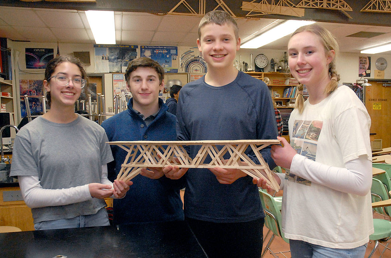The second place bridge is held by Port Angeles High School students, from left, Olivia Carol, Corey Young, Adam Weller and Gillian Wolfe. (Keith Thorpe/Peninsula Daily News)