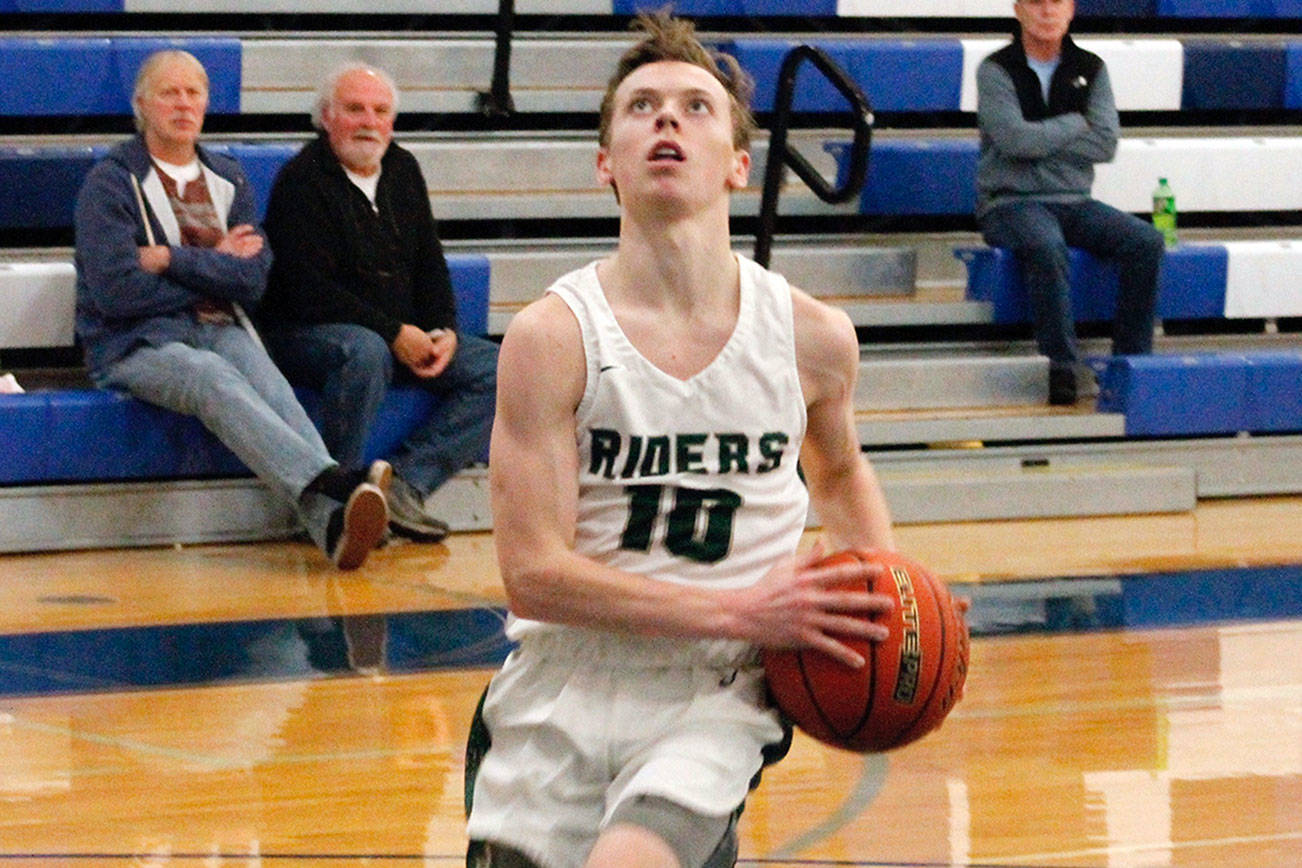 DISTRICT BASKETBALL: Port Angeles boys stay alive; Roughrider girls advance to district championship game