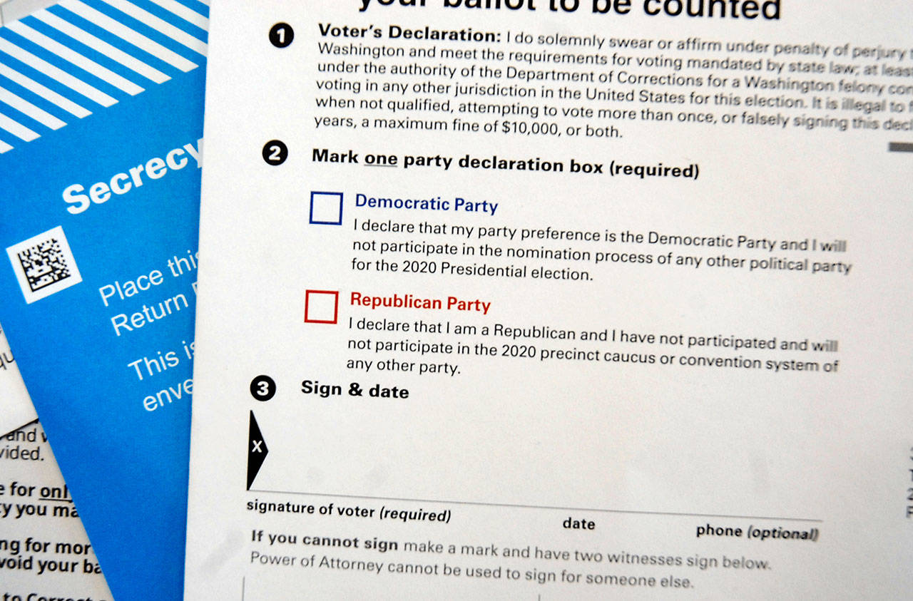Check boxes asking voters to declare a party preference are printed on the outside of the 2020 presidential primary ballot near the name of the voter casting the ballot. (Photo Illustration by Keith Thorpe/Peninsula Daily News)