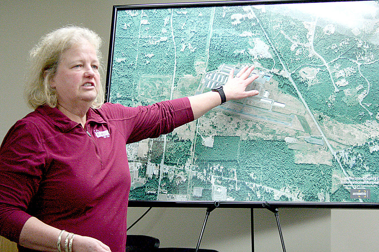 Shannon Kinsella, the airport and waterfront group director for Reid Middleton of Everett, discusses the runway reconstruction project scheduled to begin May 4 at the Jefferson County International Airport. (Brian McLean/Peninsula Daily News)