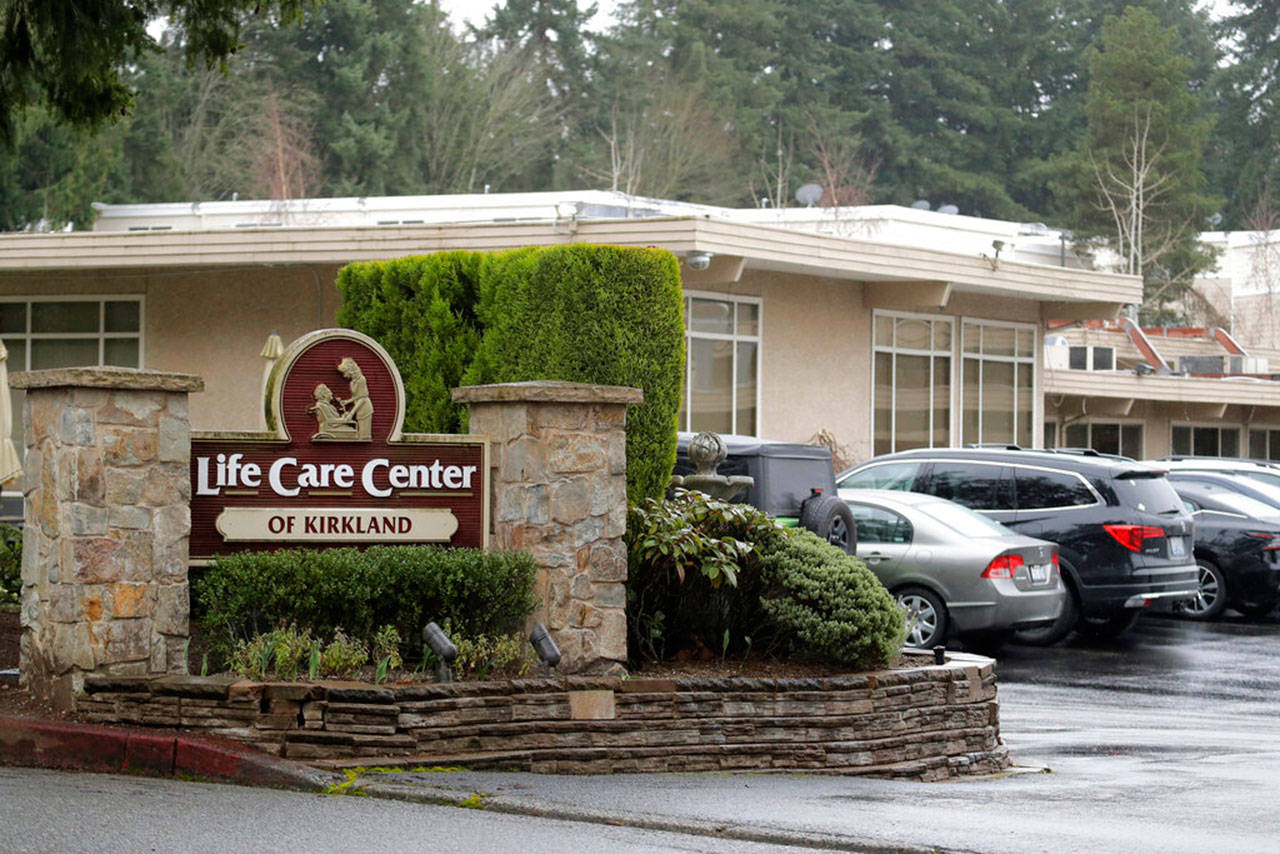 A sign at the entrance of the Life Care Center is show in Kirkland near Seattle on Monday, March 2, 2020. Dozens of people associated with the facility are reportedly ill with respiratory symptoms or hospitalized and are being tested for the COVID-19 virus. (Ted S. Warren/The Associated Press)