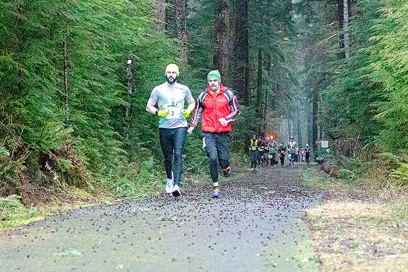 Matt Sagen A member of Atlas Athletes from Olympic leads the pack at the second annual Frosty Moss relay race held along the Olympic Peninsula on Saturday. Atlas Athletes won the 80-mile race in a time of 9 hours, 29 minutes, 15 seconds.