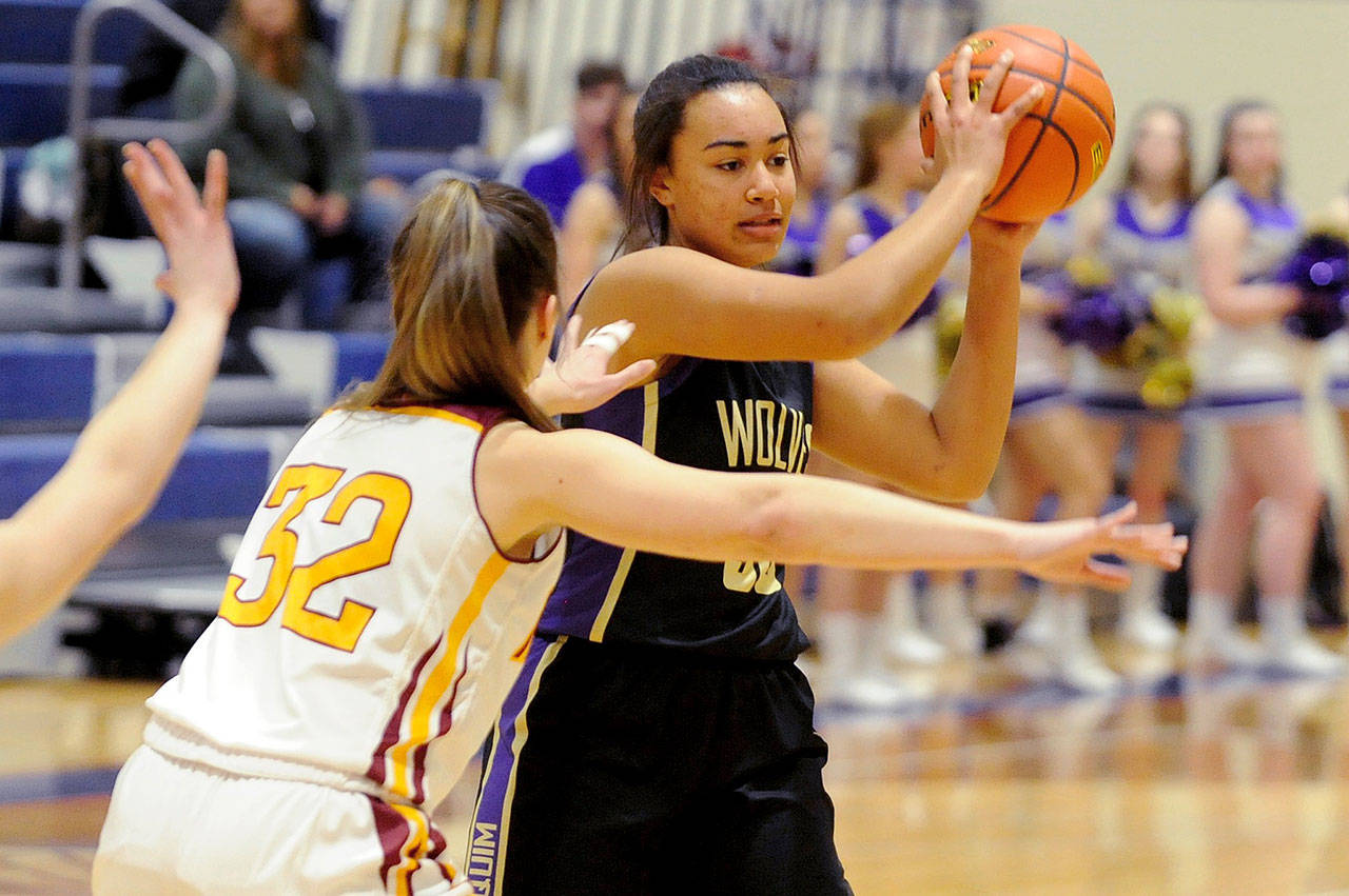 Sequim’s Jayla Julmist, right, was named to the Olympic League 2A Division all-league girls’ first team. (Conor Dowley/Olympic Peninsula News Group)