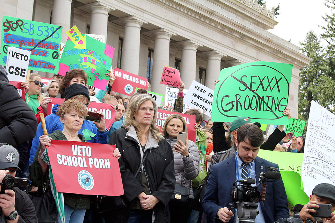 Protesters urge governor to veto sex education legislation
