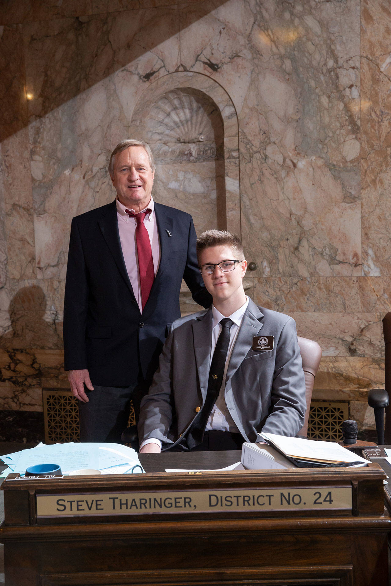 Sequim High School junior Peter Silliman is pictuered with Rep. Steve Tharinger during his week in the state House of Representatives as a page. week. Photo courtesy of Washington State Legislative Support Services