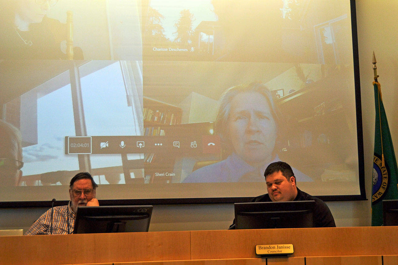 Sequim Police Chief Sheri Crain video calls into a special city council meeting Monday, March 16, 2020, where council members declared a civil emergency to better seek support for the area during the coronavirus pandemic. (Matthew Nash/Olympic Peninsula News Group)