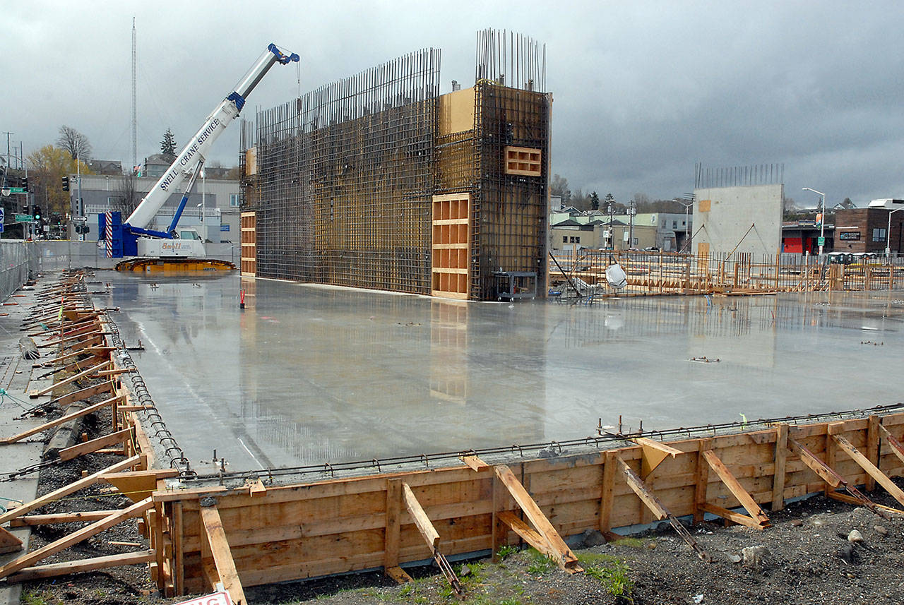 The site of the future Field Arts & Events Center on the Port Angeles waterfront sits idle Tuesday, March 31, 2020, after construction was put on hold because of the COVID-19 pandemic. (Keith Thorpe/Peninsula Daily News)