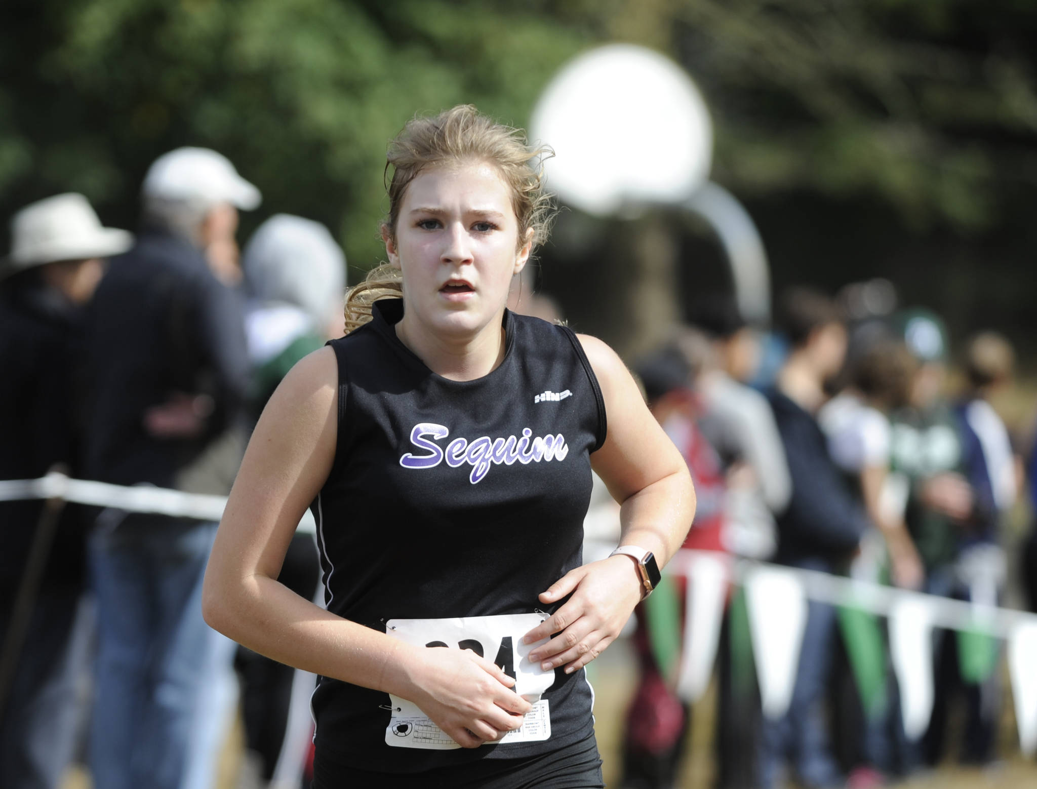 Sequim High senior Emily Silva, pictured here racing at the Salt Creek Invitational in 2019, recently signed a letter of intent to compete in cross country and track at Olympic College. (Michael Dashiell/Olympic Peninsula News Group file)
