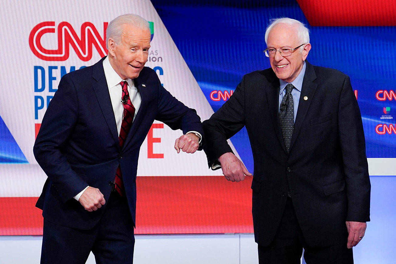 Sanders backs Biden as ex-rivals join forces to beat Trump