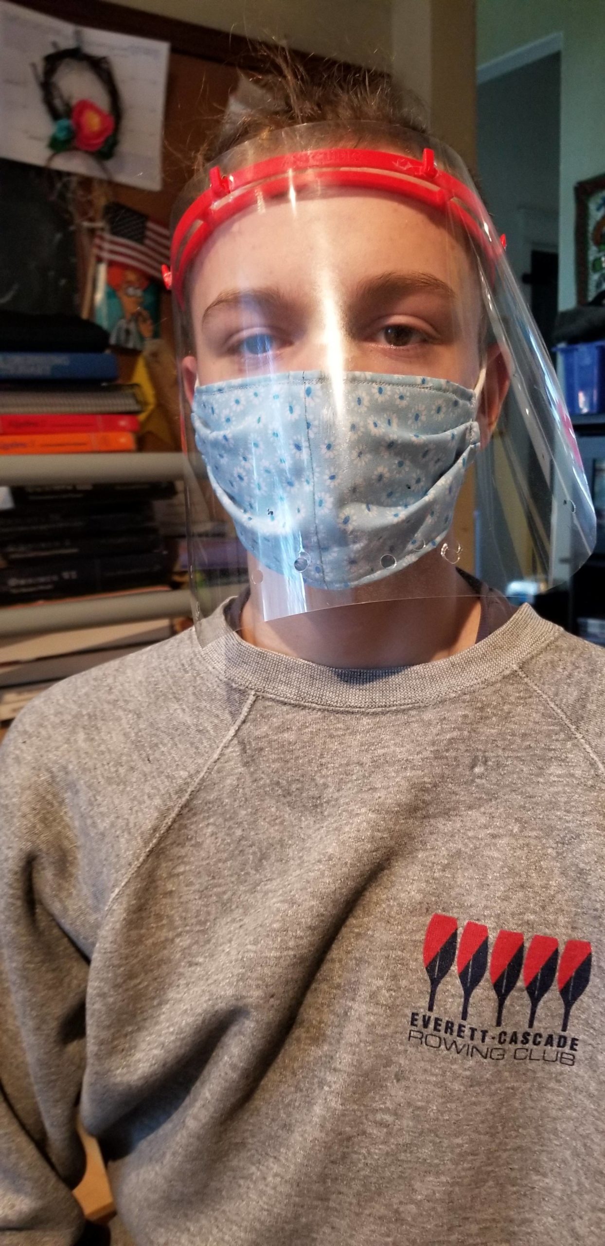 Ryan Andrews displays face shields he and brother Aaron Andrews are making for a number of health care workers in local, regional and out-of-state communities. Leah Andrews