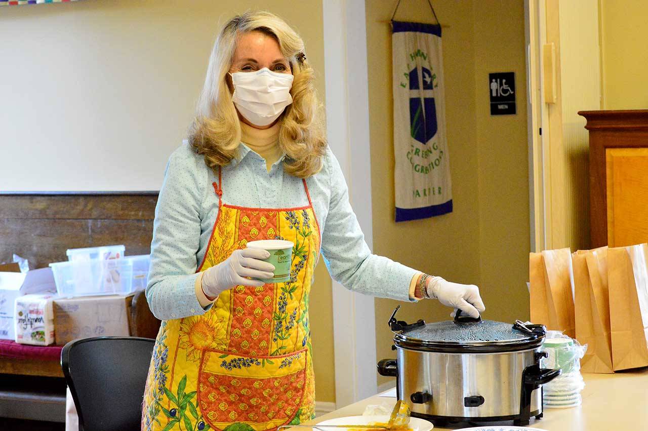 Just Soup volunteer Nancy Smee helped serve dozens of lunches outside the St. Paul’s Episcopal Church parish hall in Port Townsend. (Diane Urbani de la Paz/for Peninsula Daily News)