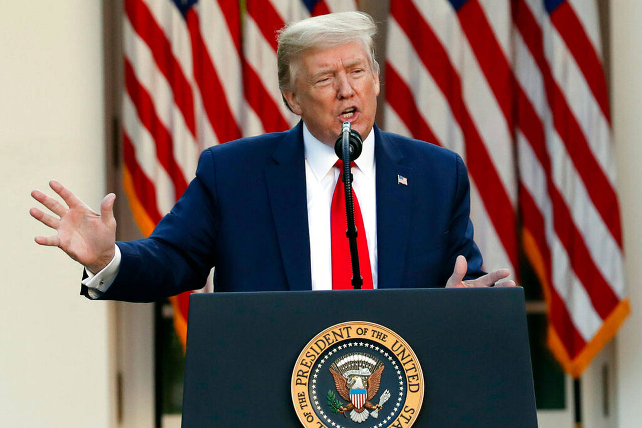 President Donald Trump speaks about the coronavirus in the Rose Garden of the White House on Monday, April 27, 2020, in Washington. Trump says states should “seriously consider” reopening their public schools before the end of the academic year, even though dozens already have said it would be unsafe for students to return until the summer or fall. (Alex Brandon/Associated Press)