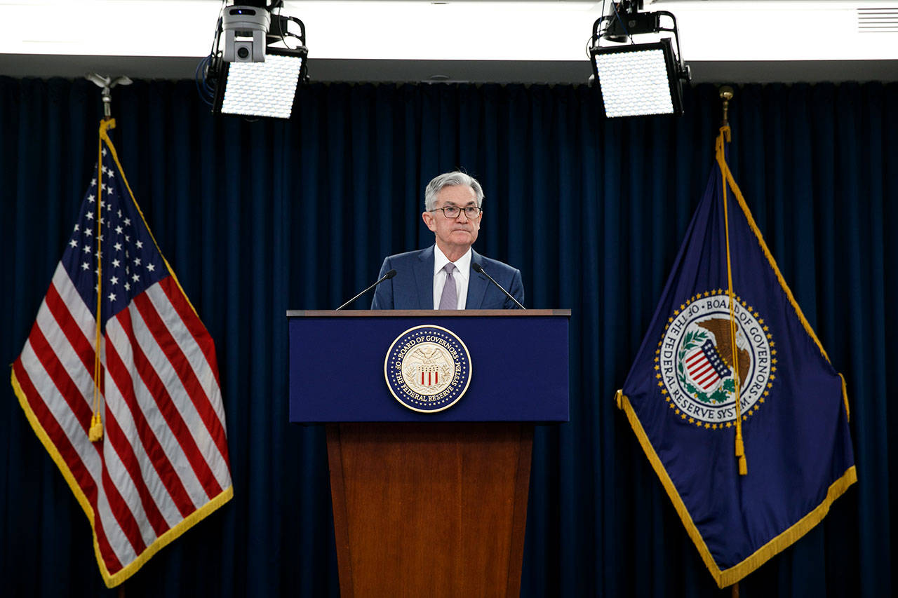 In this March 3, 2020, file photo, Federal Reserve Chair Jerome Powell speaks during a news conference to discuss an announcement from the Federal Open Market Committee, in Washington. The Federal Reserve said Friday, April 24, it had $85.8 billion in loans outstanding last week in three of the programs it rolled out last month to protect the economy during the coronavirus pandemic. (Jacquelyn Martin/Associated Press file)