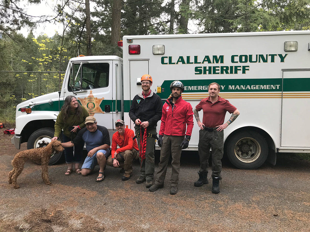 The Clallam County Sheriff Search and Rescue team poses for a photo after saving a 7-month-old puppy named Zola.