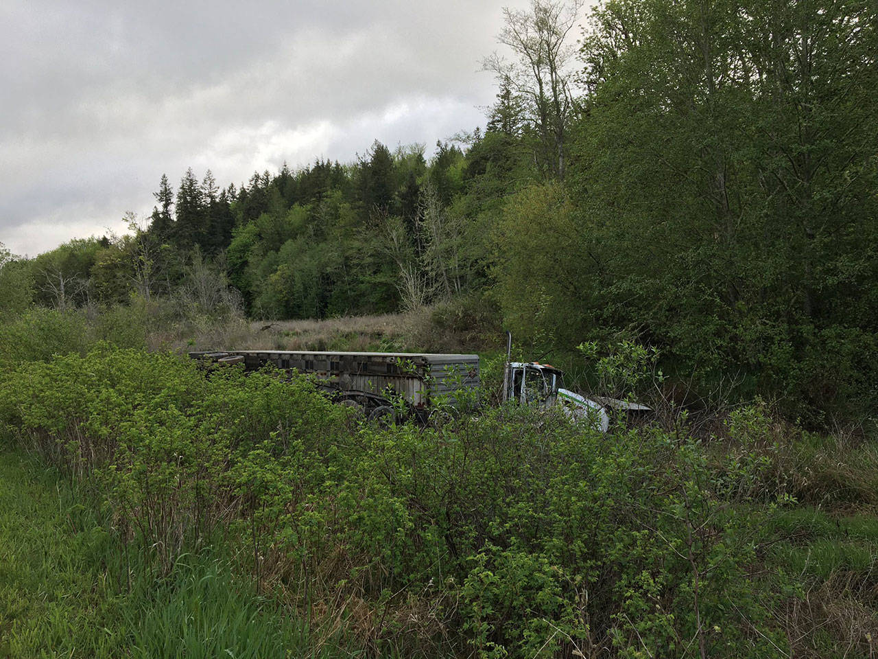 A semi carrying propane tanks flipped over at Leland Cutoff Road in Quilcene at approximately 8 a.m. Wednesday, May 6, 2020. (Washington State Trooper Chelsea Hodgson)