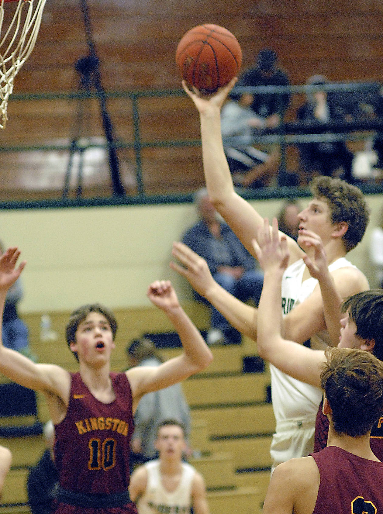 High school boys basketball games will feature a 30-second shot clock beginning next season. The move, part of a number of rules changes adopted by the WIAA, standardizes the shot clock for boys and girls basketball. (Keith Thorpe/Peninsula Daily News file)