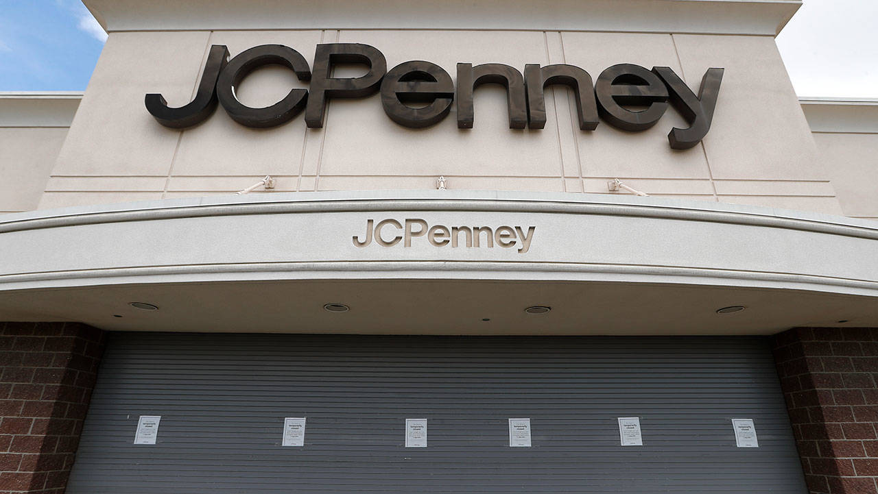 In this May 8, 2020, file photo, a J.C. Penney store sits closed in Roseville, Mich. The coronavirus pandemic has pushed troubled department store chain J.C. Penney into Chapter 11 bankruptcy. It is the fourth major retailer to meet that fate. Penney said late Friday, May 15, 2020, it will be closing some stores and will be disclosing details and timing in the next few weeks. (Paul Sancya/Associated Press file)
