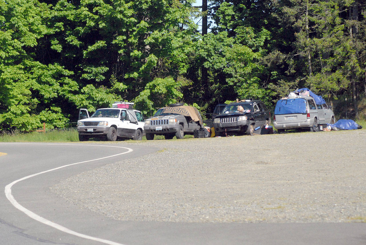 A line of vehicles are shown parked at the Deer Park Rest Area on U.S. Highway 101 east of Port Angeles on Tuesday, May 19, 2020. (Keith Thorpe/Peninsula Daily News)
