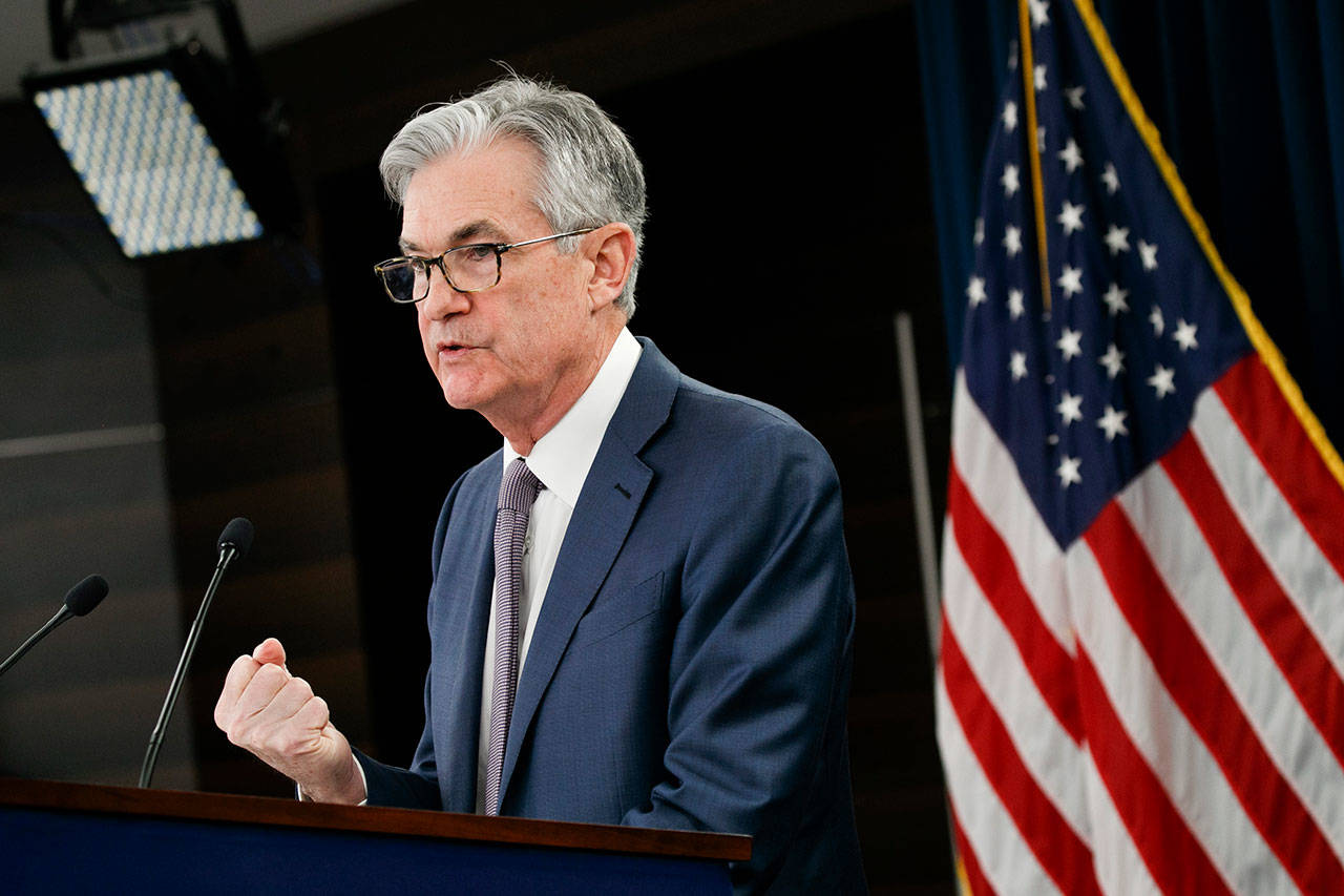 In this March 3, 2020, file photo Federal Reserve Chair Jerome Powell speaks during a news conference in Washington. Powell is pledging to reveal the names and other details of the entities that borrow from the emergency programs the central bank has set up to offset the economic hit from the viral outbreak. In prepared testimony for a Tuesday, May 19, 2020, congressional hearing, Powell says the central bank will disclose the amounts borrowed and the interest rates it levies under its programs to provide credit for large corporations, state and local governments, and medium-sized businesses. (Jacquelyn Martin/Associated Press file)