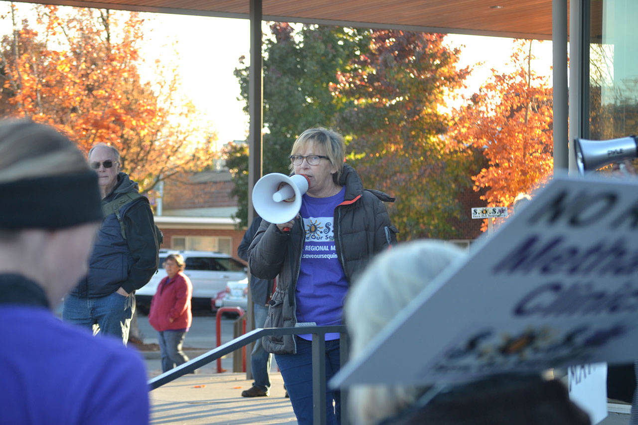 Members of Save Our Sequim, including chairman Jodi Wilke, seen here at a rally in October 2019, and Jon Gibson, owner of Parkwood Manufactured Housing Community, seek to halt the application for the medication-assisted treatment (MAT) facility from moving forward with a lawsuit through Clallam County Superior Court. (Matthew Nash/Olympic Peninsula News Group file)