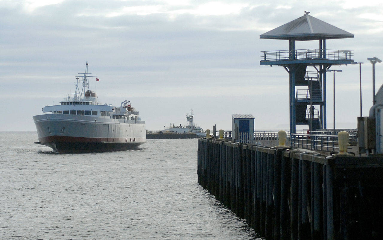 The ferry MV Coho sails past Port Angeles City Pier during a shakedown run Tuesday, May 19, 2020, in Port Angeles Harbor. The boat was taken on a maintenance run into the Strait of Juan de Fuca and around portions of the harbor to keep it in shape for a future return to service. (Keith Thorpe/Peninsula Daily News)