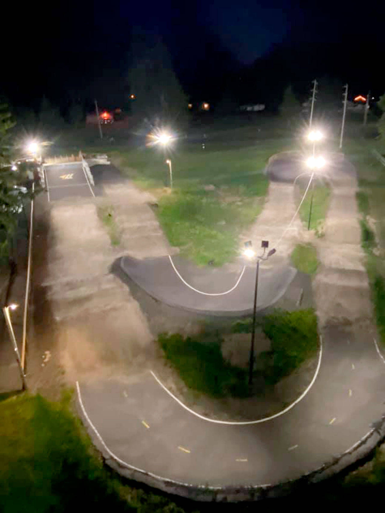 Light fixtures have been installed at Port Angeles’ Lincoln Park BMX Track. Crews from Simpson Electric, along with volunteer assistance, paved the way for the installation. (Lincoln Park BMX Track)