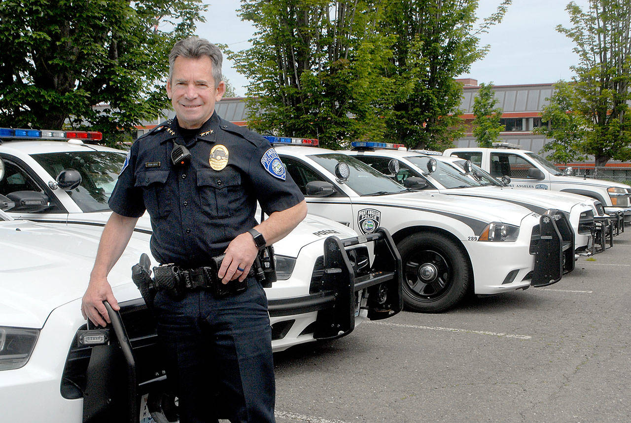Port Angeles Police Chief Brian Smith, shown outside the police station, said his agency practices “community-oriented policing” and is trained to avoid the use of force whenever possible. (Keith Thorpe/Peninsula Daily News)