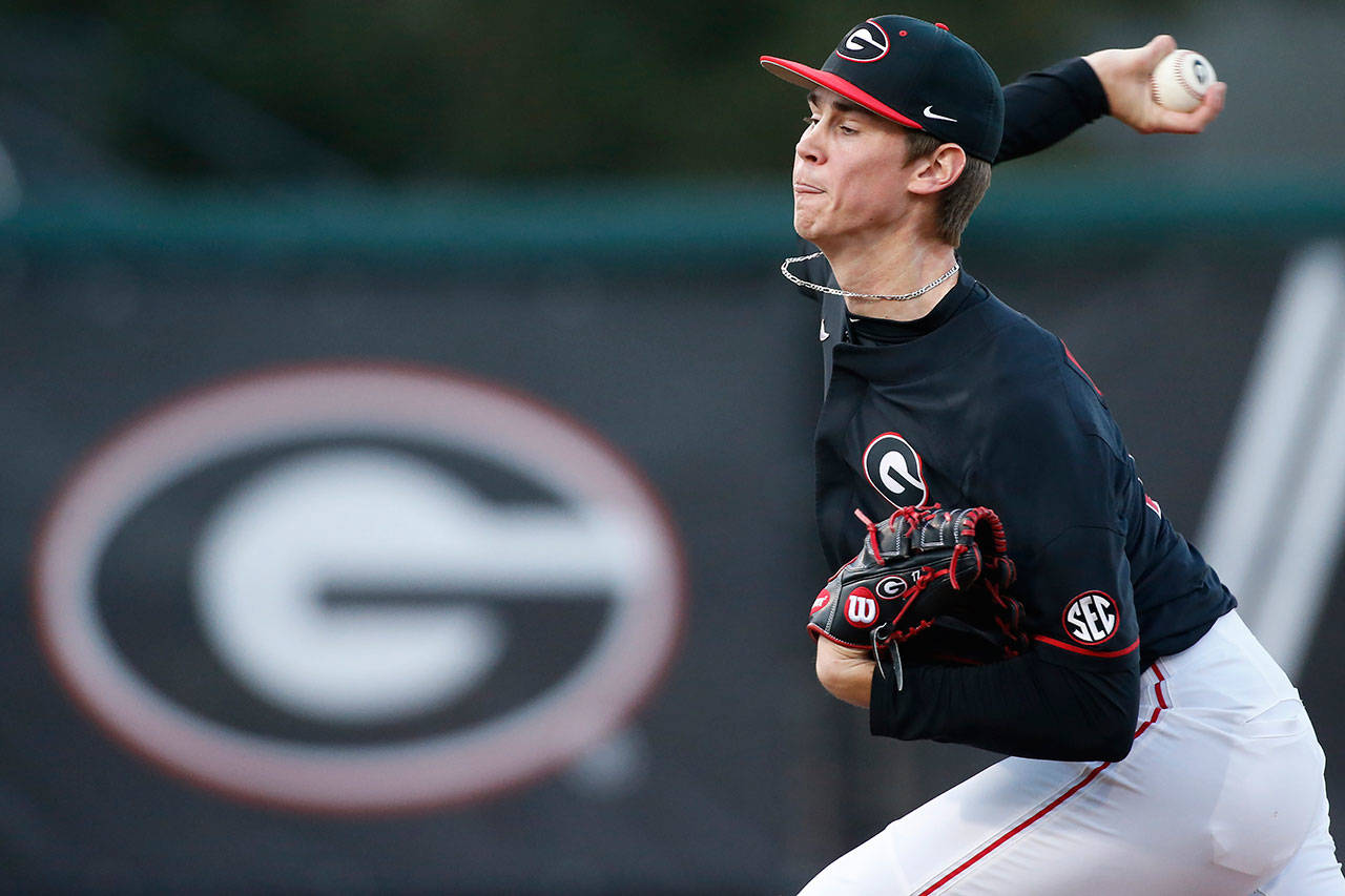 In this March 22, 2019, file photo, Georgia’s Emerson Hancock throws the ball against LSU during an NCAA college baseball game in Athens, Ga. Hancock is expected to be an early selection in the Major League Baseball draft. (Joshua L. Jones/Athens Banner-Herald via AP, File)