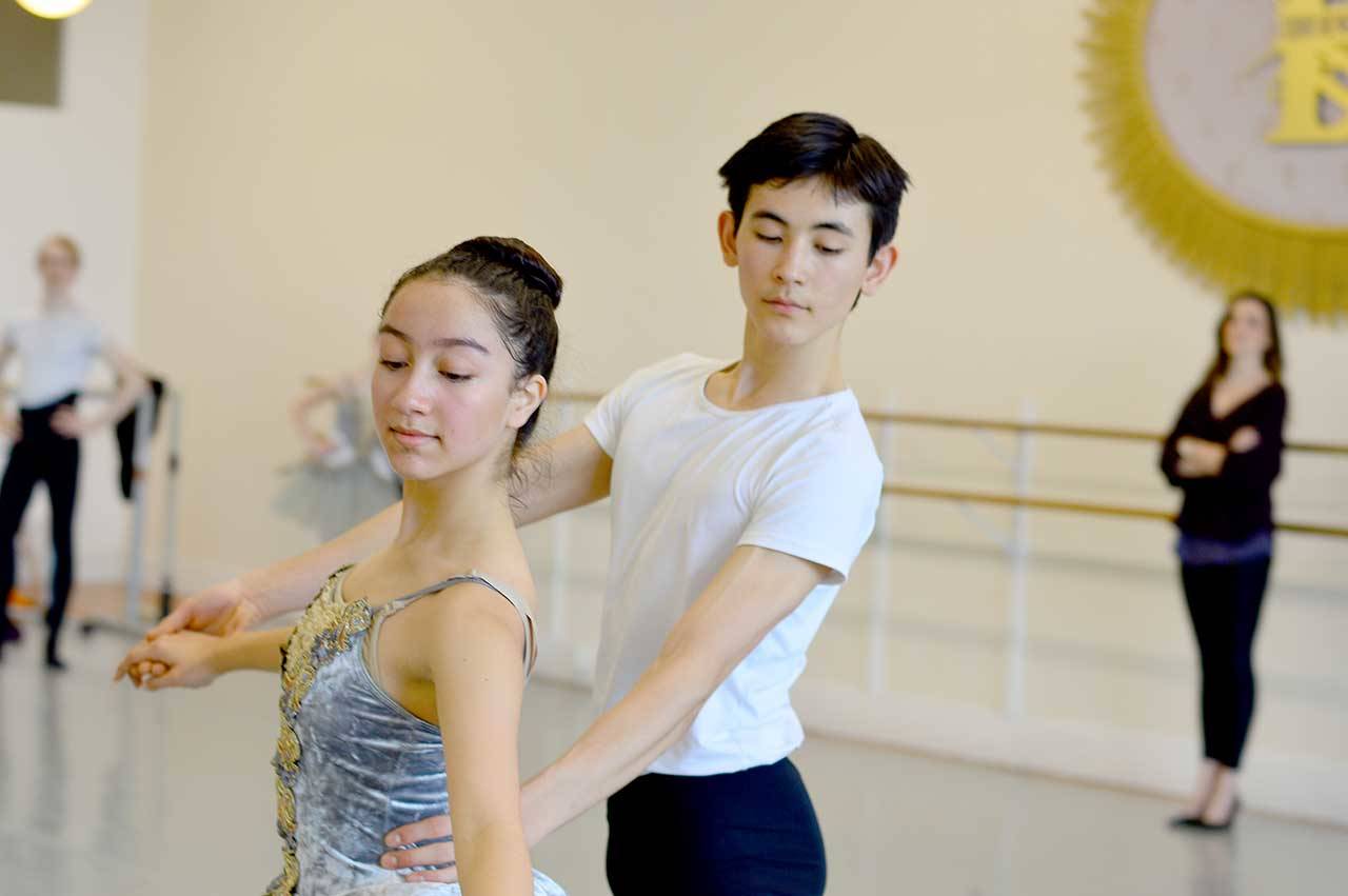 Isabella Knott of Port Angeles and Joh Merrill of Seattle rehearse at the Ballet Workshop earlier this year. They are part of the cast of the Ballet Workshop’s 50th anniversary gala, one of the events that may be rescheduled at the Port Angeles High School Performing Arts Center. (Diane Urbani de la Paz/for Peninsula Daily News)