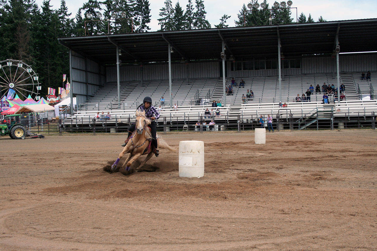 Ebony Billings racing Sunny at the Clallam County Fair 4-H games show in 2017. (Karen Griffiths/for Peninsula Daily News)