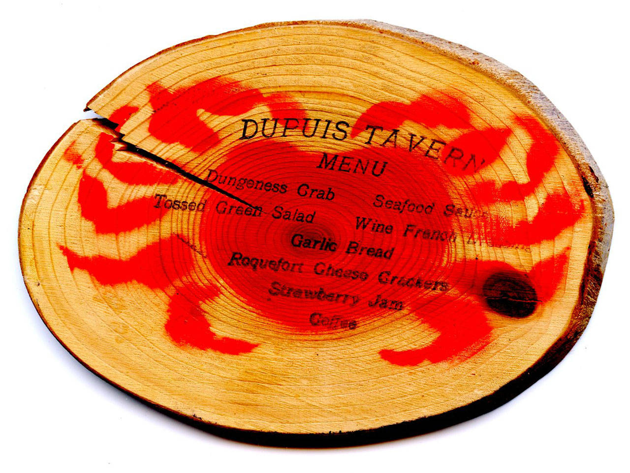 An old menu written on wood sliced from a tree limb. (Dupuis Restaurant collection)
