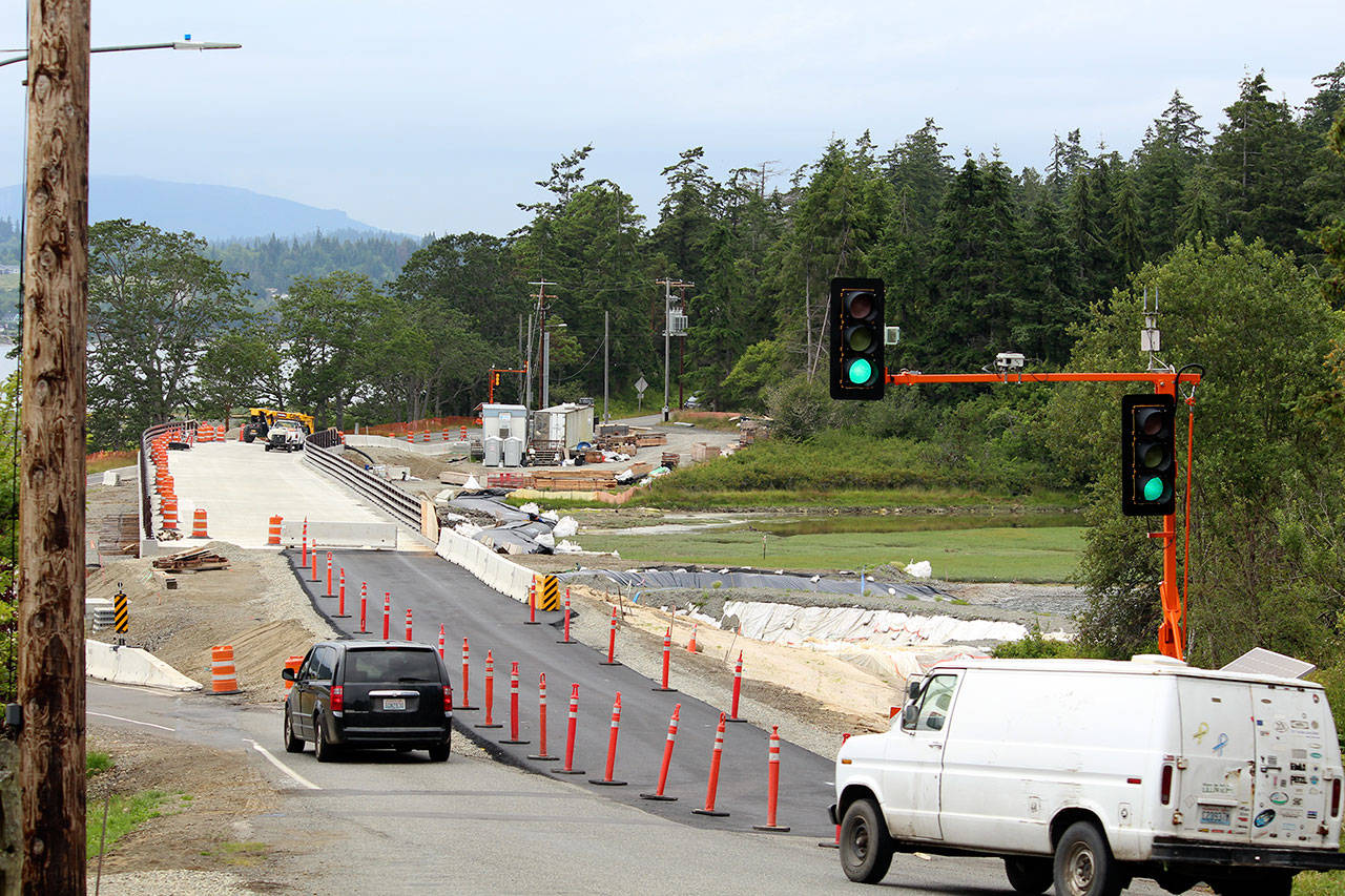 The bridge at Kilisut Harbor opens to one-lane alternating traffic today after it’s been under construction for almost a year. Remaining construction and work on the channel will be completed through summer and wrap up in early fall. (Zach Jablonski/Peninsula Daily News)