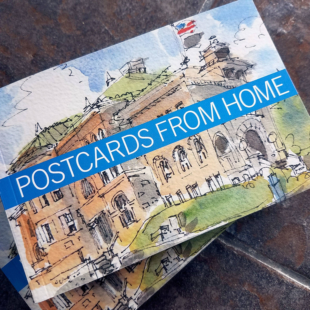 Postcards From Home: The Book is available at PtSA Grover Gallery or through PtArts.org