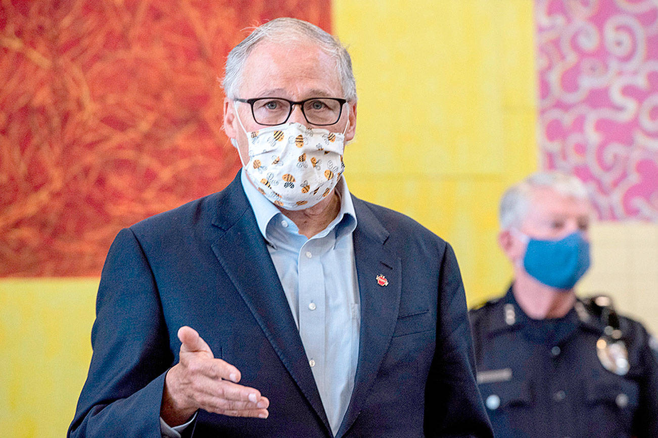 Washington Gov. Jay Inslee speaks at the Columbia Basin College campus in the Tri-Cities on Tuesday June 30, 2020 about the spread of the coronavirus in Benton and Franklin counties. (Jennifer King/The Tri-City Herald via AP)