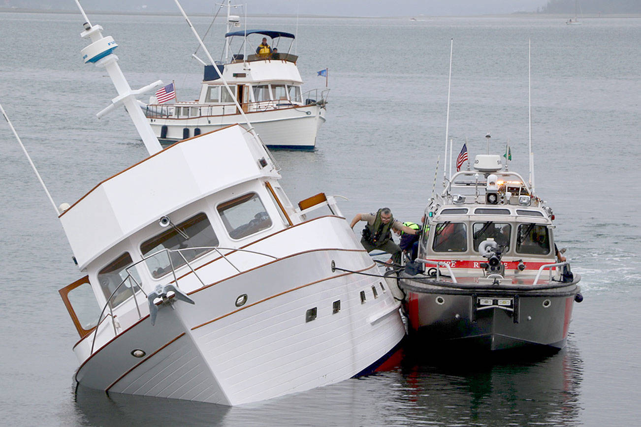 Three rescued from sinking boat in Port Townsend Bay