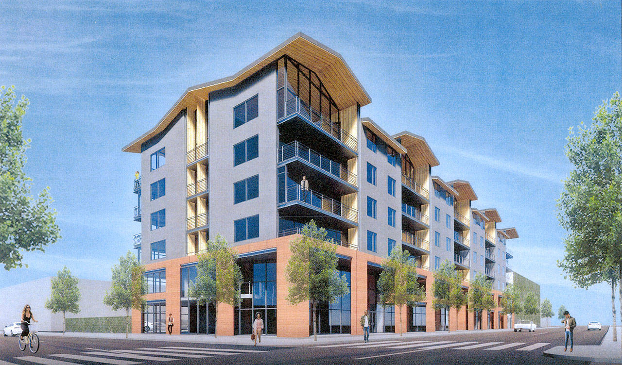 An artists rendering shows the concept of a seven-story Anian Shores building on the Port Angeles waterfront. A conditional use permit has been granted for the building, which is planned to exceed height limitations.
