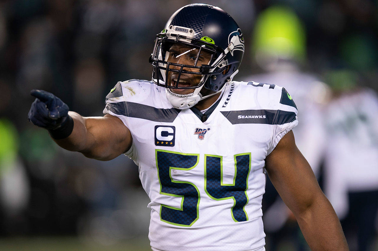 In this Jan. 5, 2020, file photo, Seattle Seahawks middle linebacker Bobby Wagner (54) reacts during an NFL wild-card playoff football game against the Philadelphia Eagles in Philadelphia. At this point of his career, Bobby Wagner is among those who almost expect the Seattle Seahawks to make some sort of splash at an unexpected time. Whether it was past moves to go get the likes of Duane Brown or Jadeveon Clowney, or last Saturday’s massive trade that brought Jamal Adams to Seattle, it’s not really a surprise anymore to the Seahawks star linebacker. (Chris Szagola/Associated Press file)