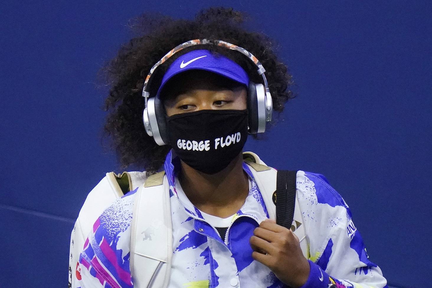 Naomi Osaka of Japan wears a protective mask featuring the name “George Floyd” while arriving on court to face Shelby Rogers of the United States during the quarterfinal round of the US Open tennis championships in New York on Tuesday, Sept. 8, 2020. (Frank Franklin II/Associated Press file)