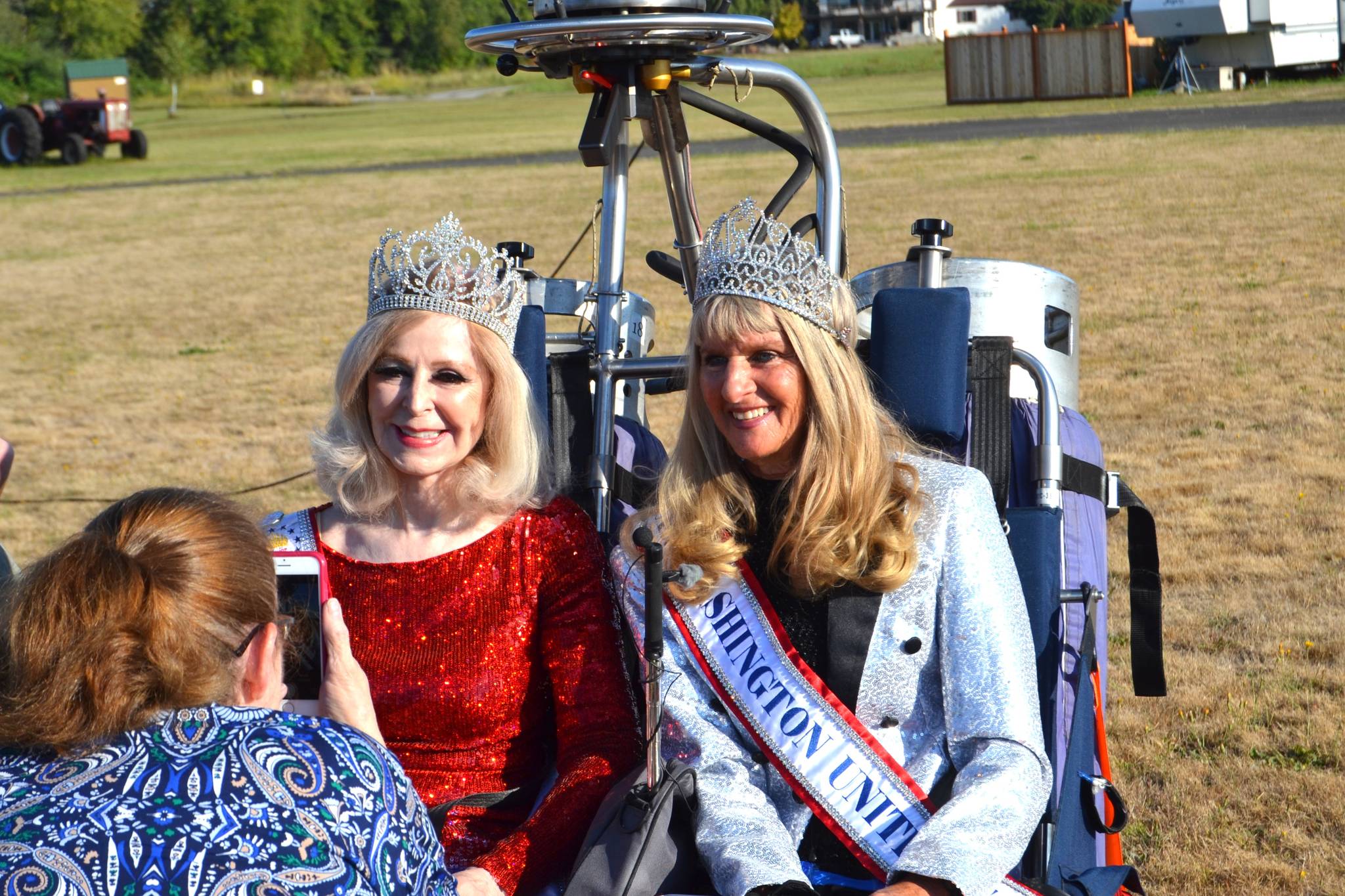Cherie Kidd, Ms. Senior USA 2019-2020, left, and Captain-Crystal Stout, Ms. Senior Washington USA, pose for a photo before they go up to shoot a promotional video for the Ms. Senior USA pageant. (Matthew Nash/Olympic Peninsula News Group)