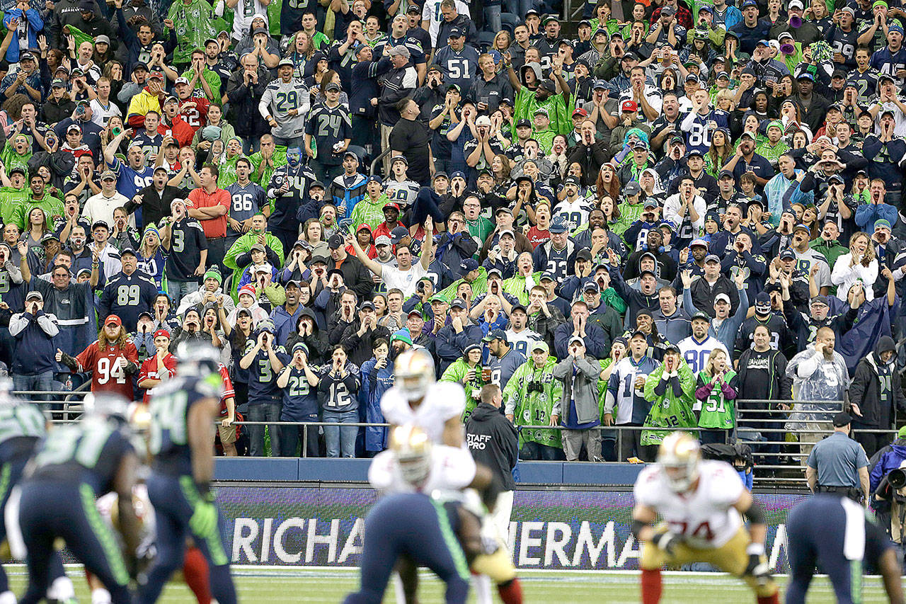 Elaine Thompson/The Associated Press Seattle Seahawks fans yell during a San Francisco 49ers possession in September 2013. One of the best homefield advantages in the NFL will sit empty on Sunday night.
