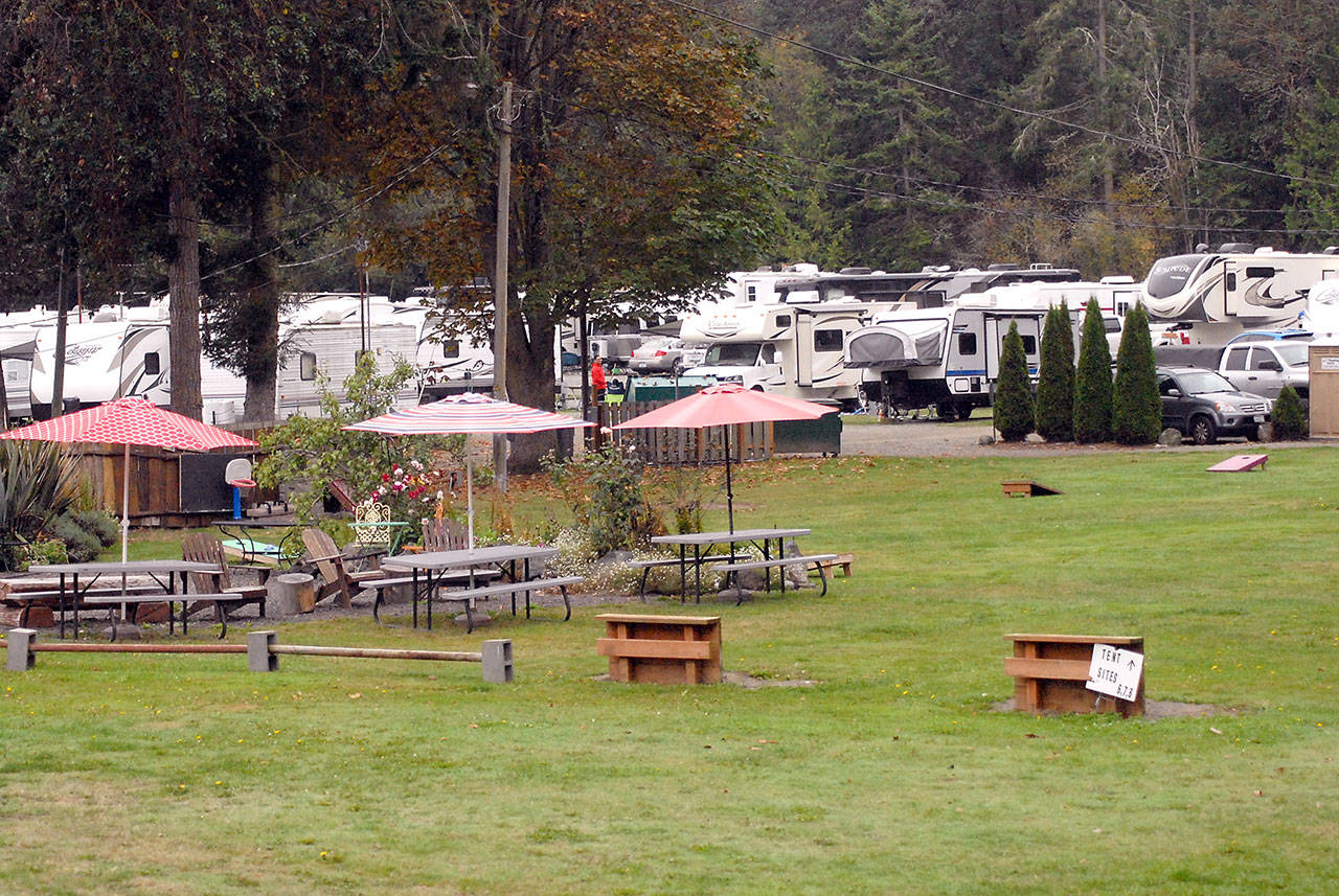 Travel trailers and RVs fill up spaces at John Wayne’s Waterfront Resort on Saturday at Sequim Bay east of Sequim. (Keith Thorpe/Peninsula Daily News)