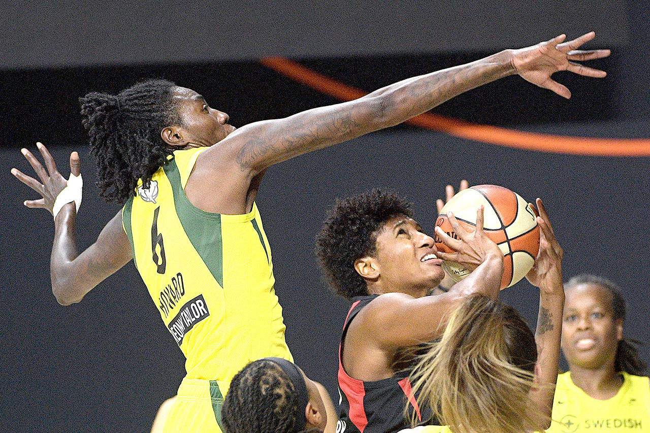 Seattle Storm forward Natasha Howard (6) goes up to block a shot by Las Vegas Aces forward Angel McCoughtry during the first half of Game 2 of basketball’s WNBA Finals, Sunday in Bradenton, Fla. (Phelan M. Ebenhack/The Associated Press)