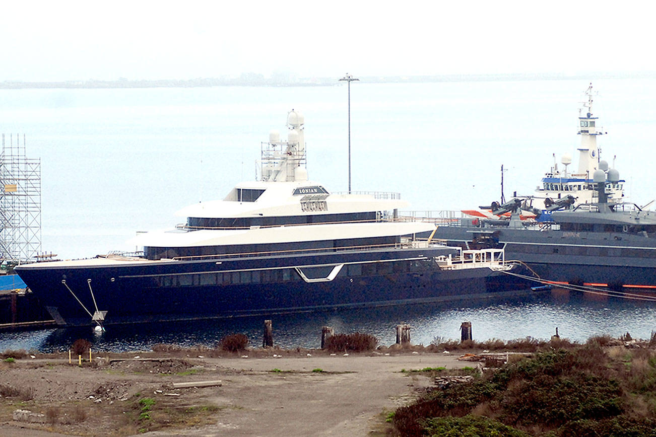 Keith Thorpe/Peninsula Daily NewsThe 285-foot mega-yacht Lonian and its support vessel, Hodor, sit moored at Port of Port Angeles Terminal 1 on Wednesday. It moored there last week for 75 days while Platypus Marine does work on the 285-foot vessel. It was built by Feadship, the Netherlands, for $160 million for Lorenzo Fertitta of Las Vegas, Nevada (https://tinyurl.com/PDN-LonianBackground). Watch it getting built at https://tinyurl.com/PDN-LonianSuperyacht.