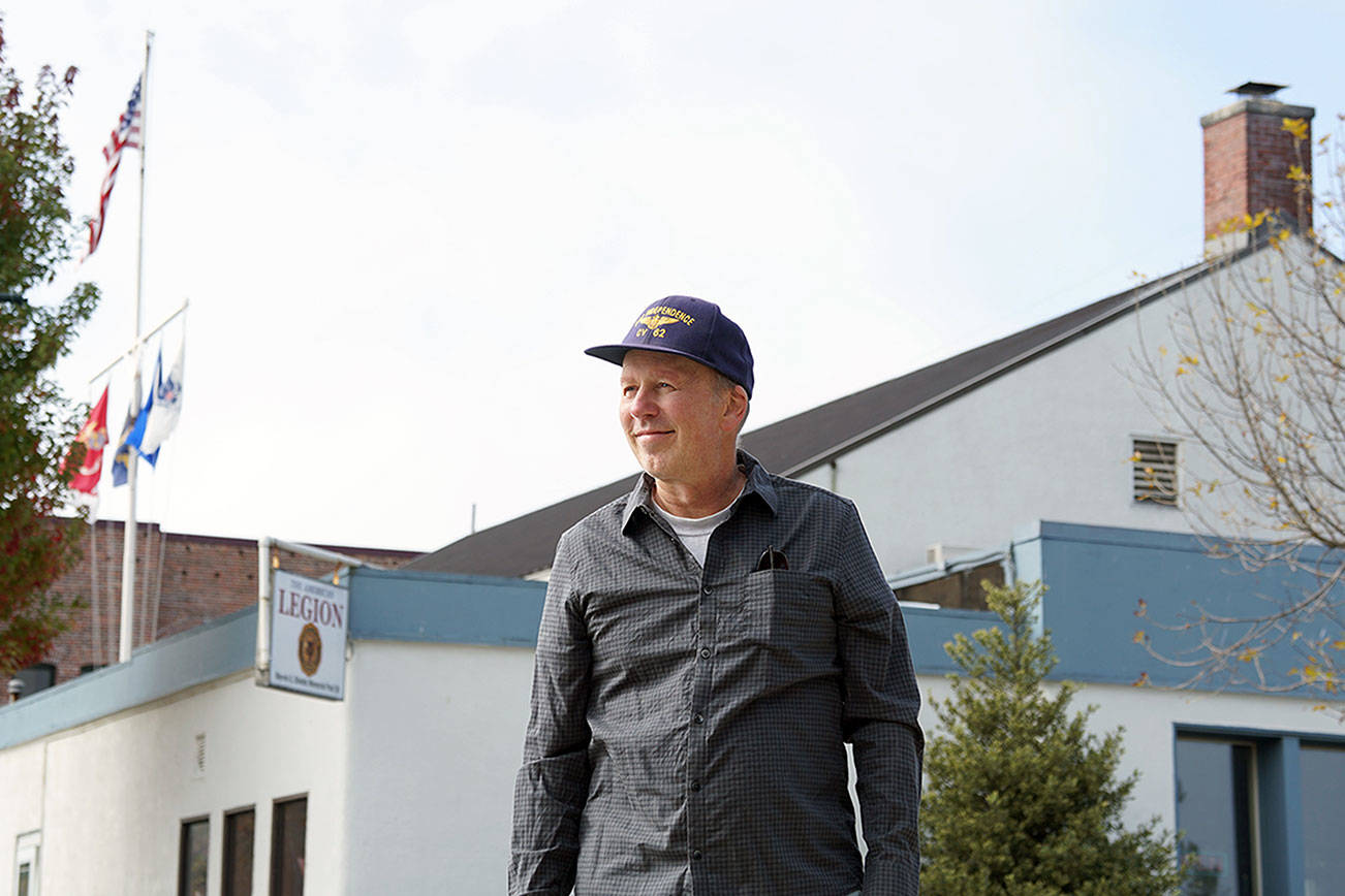 Mike Loriz, 1st vice commander of American Legion Post 26, is leading an effort to cut the Port Townsend veterans organization's electric bill while also making its 1941 downtown building more energy efficient by installing an array of solar panels on the south-facing side of its roof. Nicholas Johnson/Peninsula Daily News