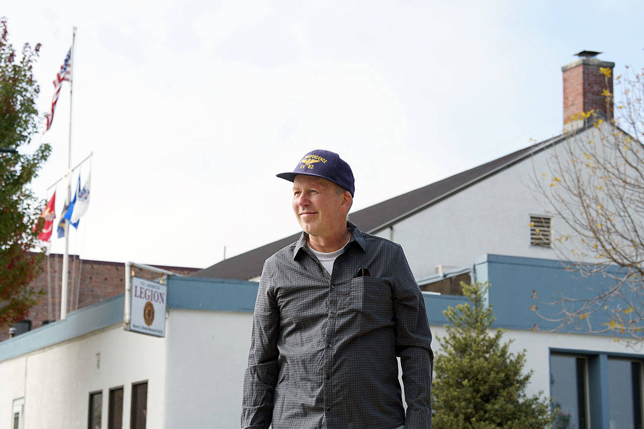Mike Loriz, 1st vice commander of American Legion Post 26, is leading an effort to cut the Port Townsend veterans organization’s electric bill while also making its 1941 downtown building more energy efficient by installing an array of solar panels on the south-facing side of its roof. (Nicholas Johnson/Peninsula Daily News)