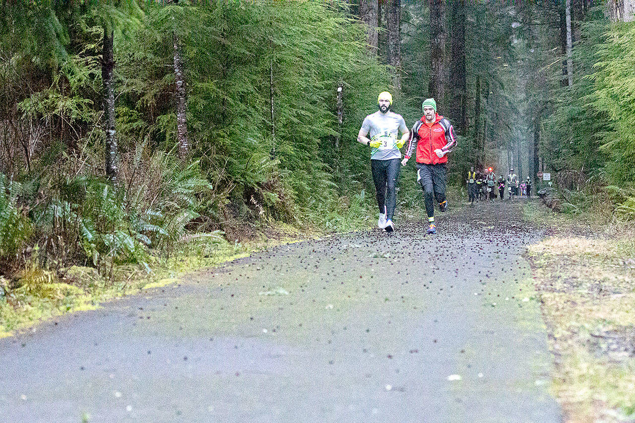 A member of Atlas Athletes from Olympia leads the pack at the second annual Frosty Moss relay race held along the Olympic Peninsula in early March. (Photo courtesy of Matt Sagen)