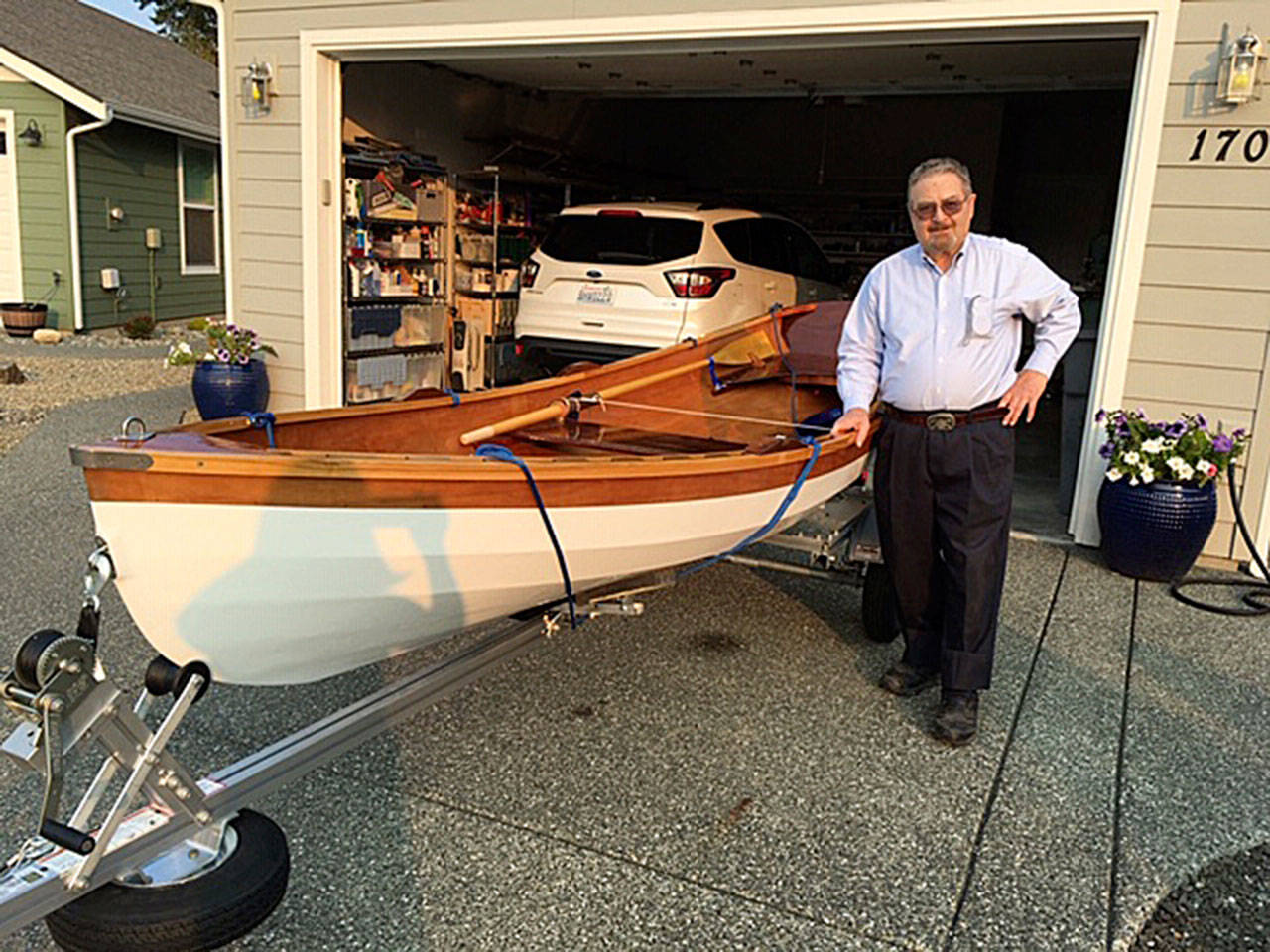 David Hough, 83, of Sequim built a boat more than 70 years ago before he became a motorcycle enthusiast. Now retired, he spent the past six months building a boat from a kit. (Submitted photo)