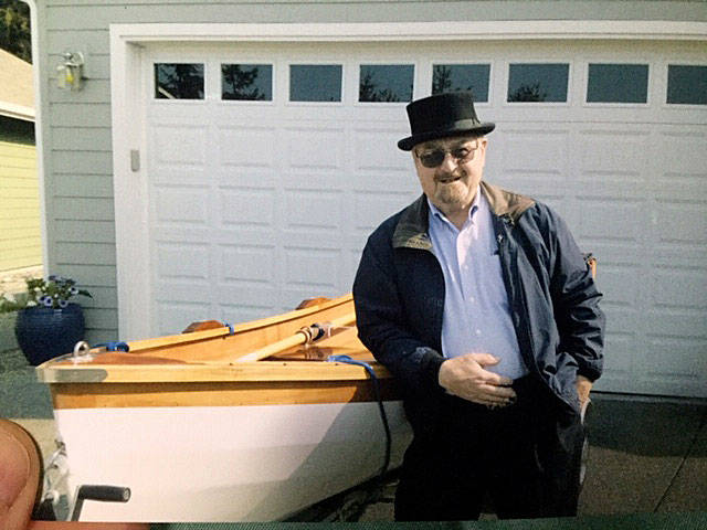 David Hough, 83, of Sequim is pictured with his boat. (Submitted photo)